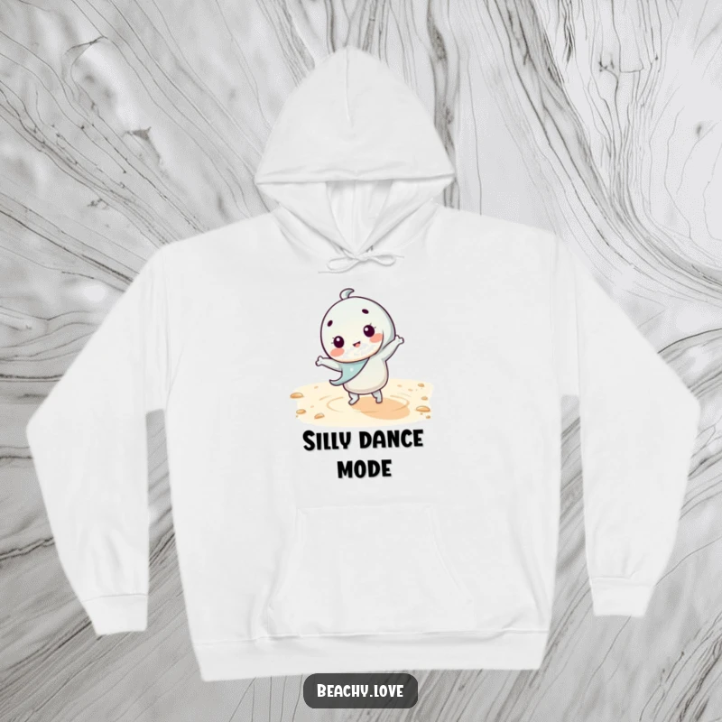 Funny kawaii character doing a silly dance on warm sand, depicted on a cozy hoodie, perfect for staying warm with a touch of humor.