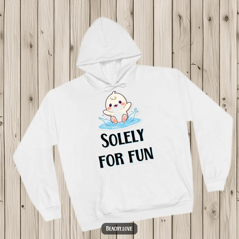 Funny kawaii character splashing water with their feet, creating a playful scene on a warm and cozy hoodie for all ages.