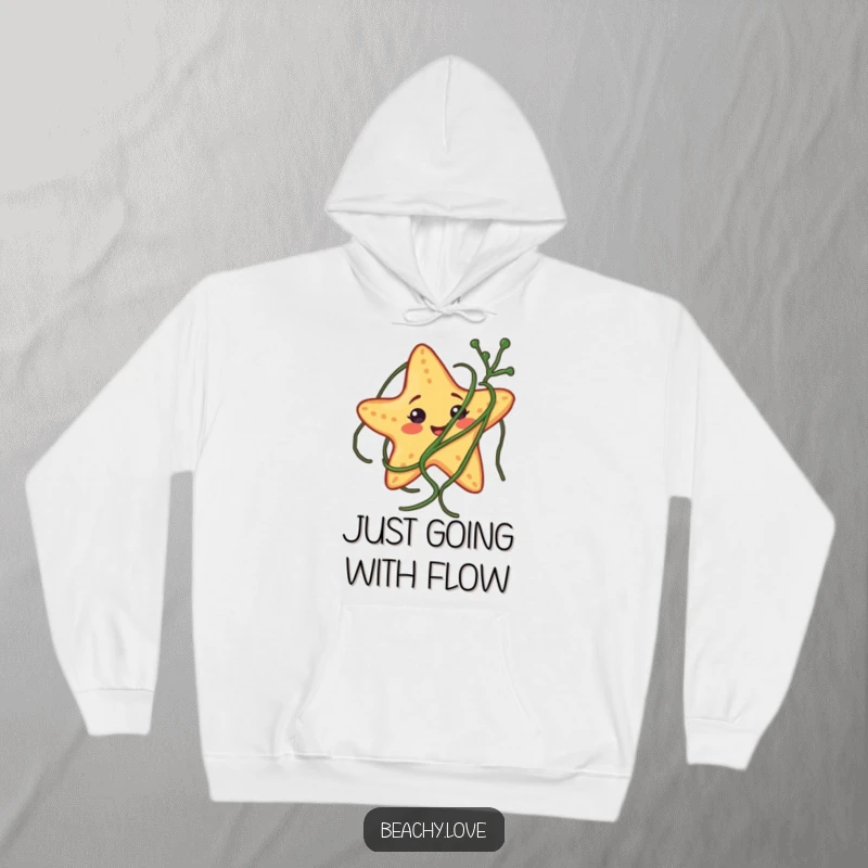 Funny hoodie showing a smiling starfish comically stuck in seaweed, offering warmth and humorous seaside vibes.