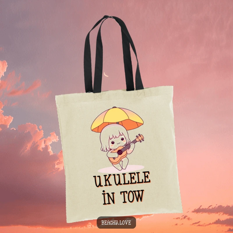 Funny tote bag featuring a charming character playing a miniature ukulele under a beach umbrella, perfect for beach outings and carrying daily essentials.